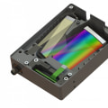 What is the function of the entrance slit in a spectrophotometer?